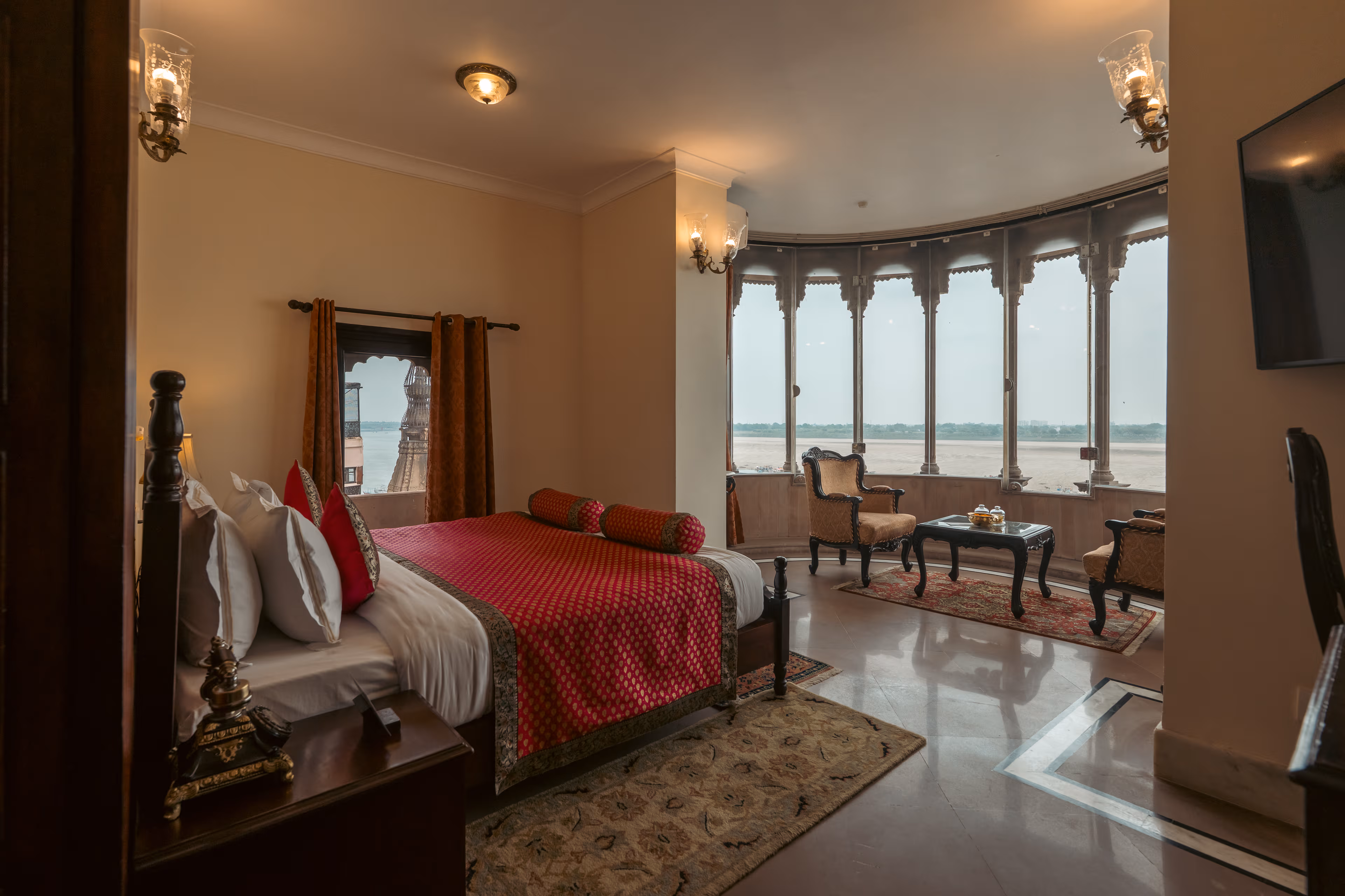 Wake up to a 180-degree view of the gently flowing Ganga from BrijRama's Varuna Burj or Maharaja suites